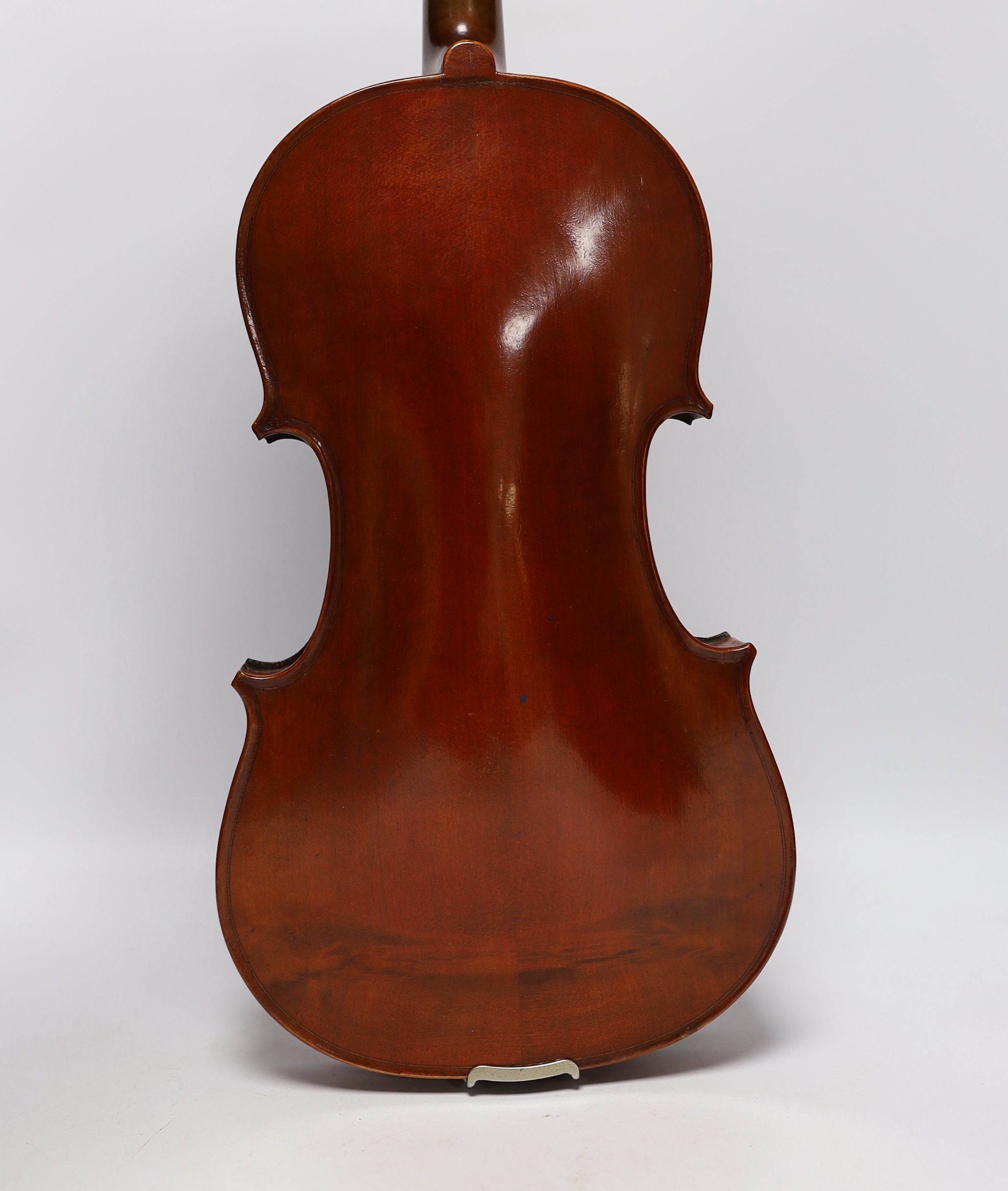 A wooden cased student violin
